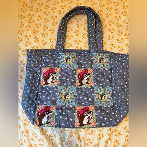 Charming Blue Quilted Tote with Cartoon Accents